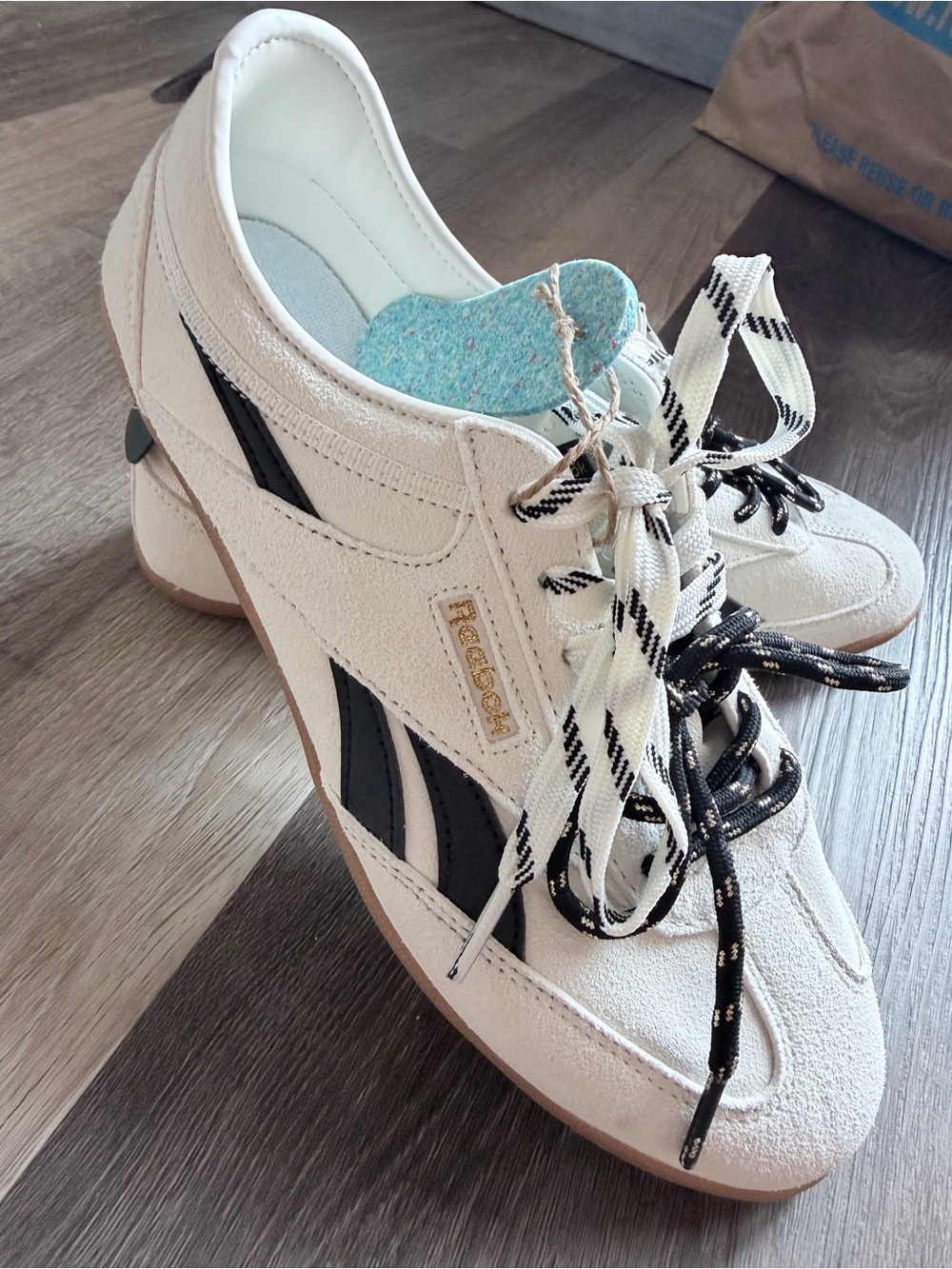 Reebok Women’s Off-White Suede Sneakers with Black Accents